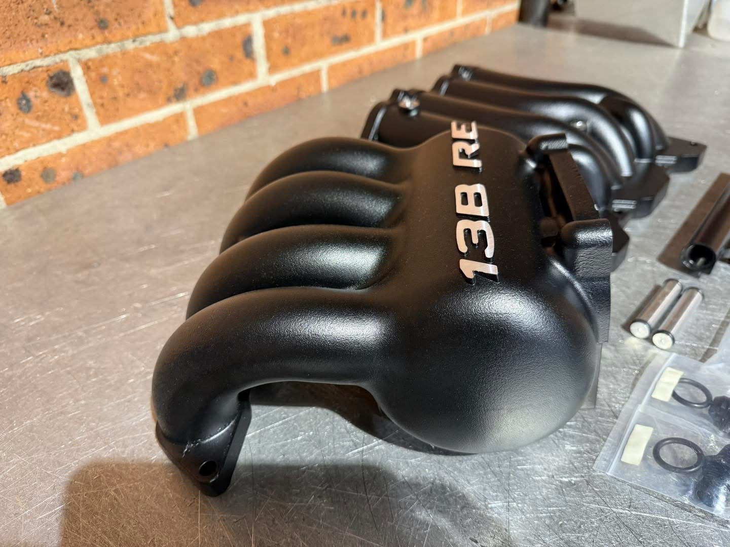13B RE upper and lower aftermarket intake