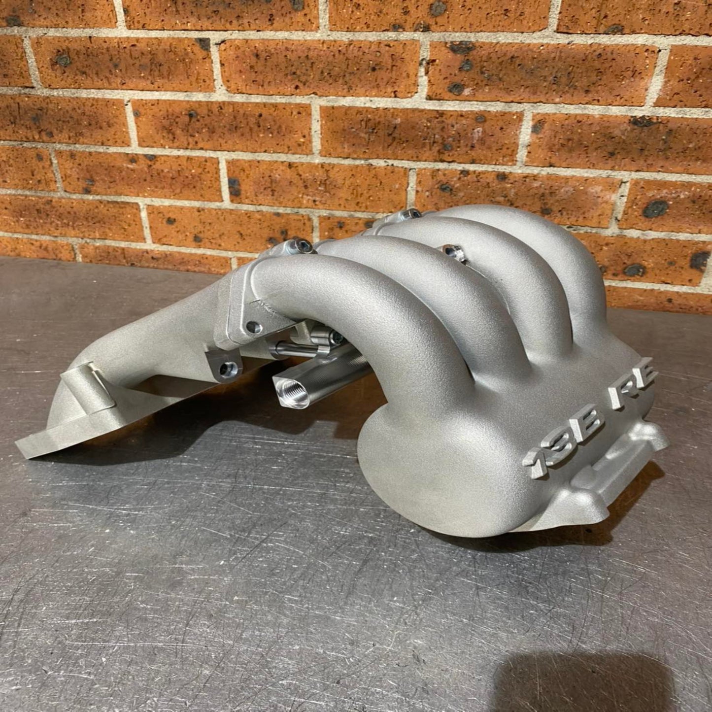 13B RE upper and lower aftermarket intake